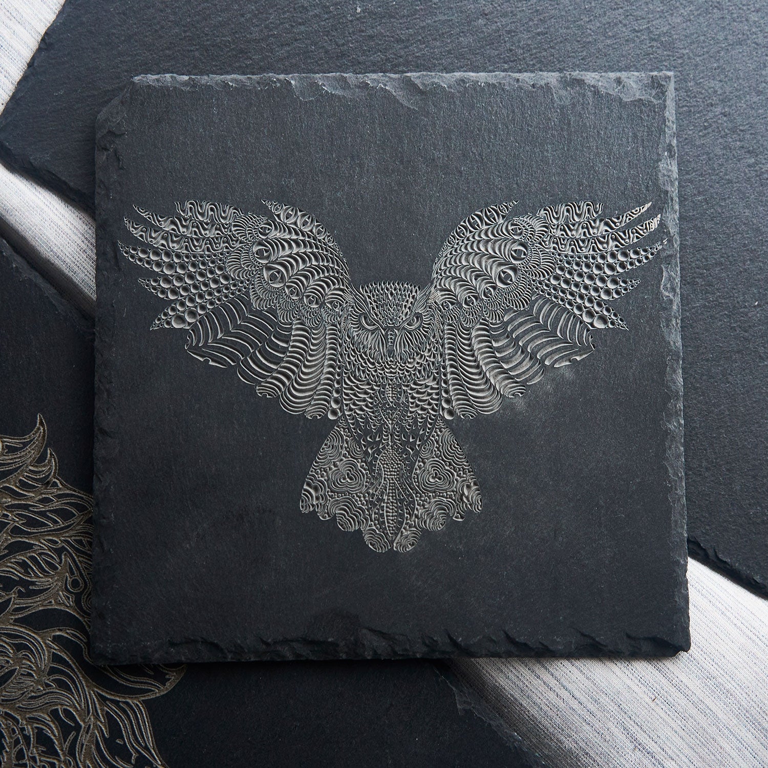 Owel Engraving on the Coaster