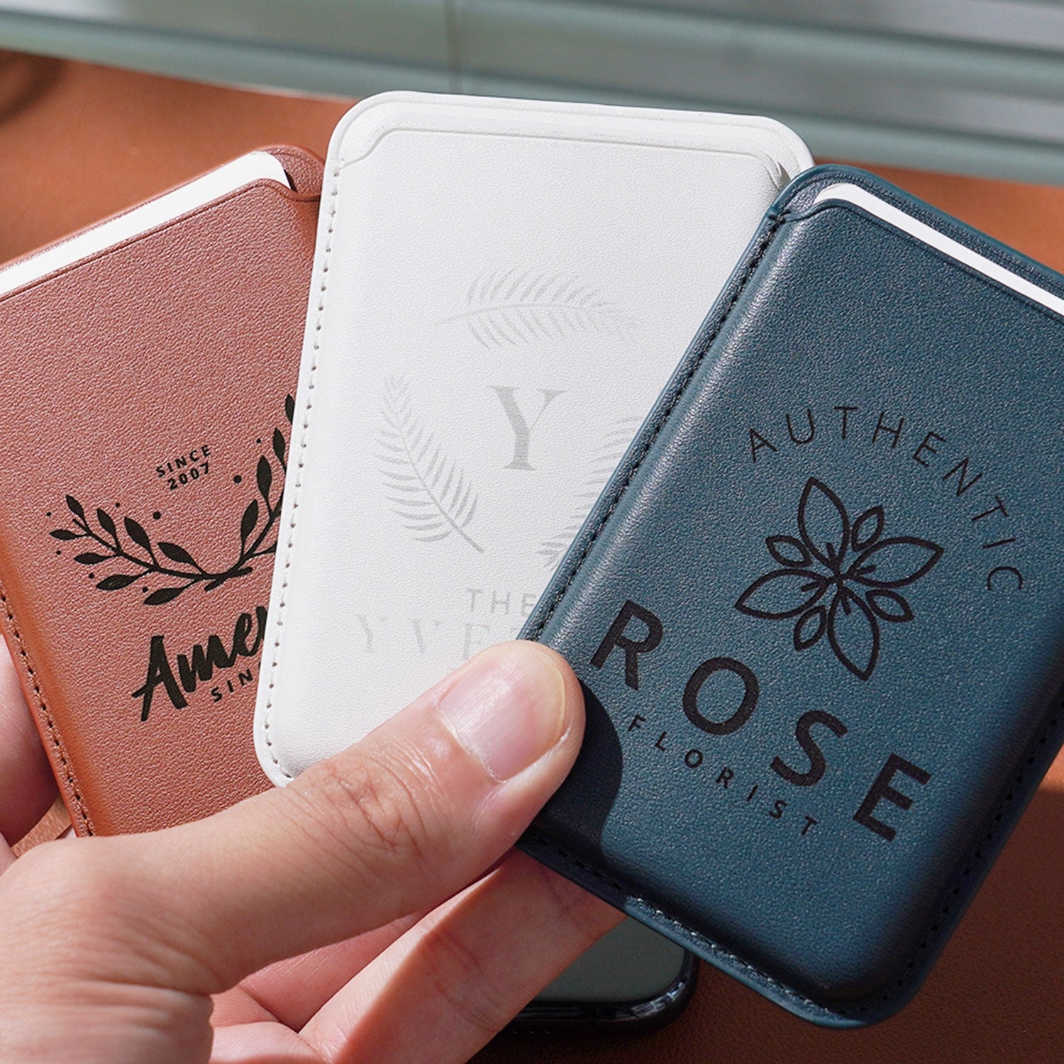 Text and pattern engravings on the card holders