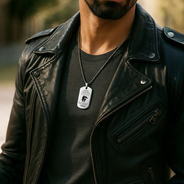 A man wears the necklace with "LOVE DAD" engraving on the pendant.