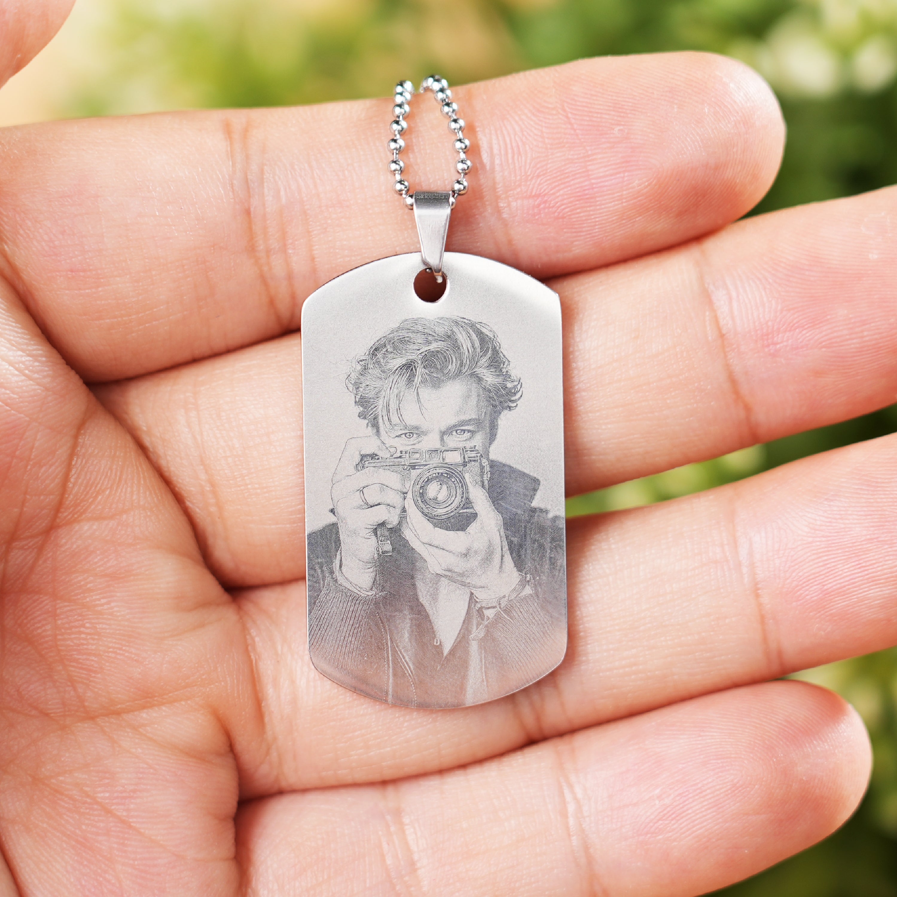 Intricate Photo Engravings on the Tag