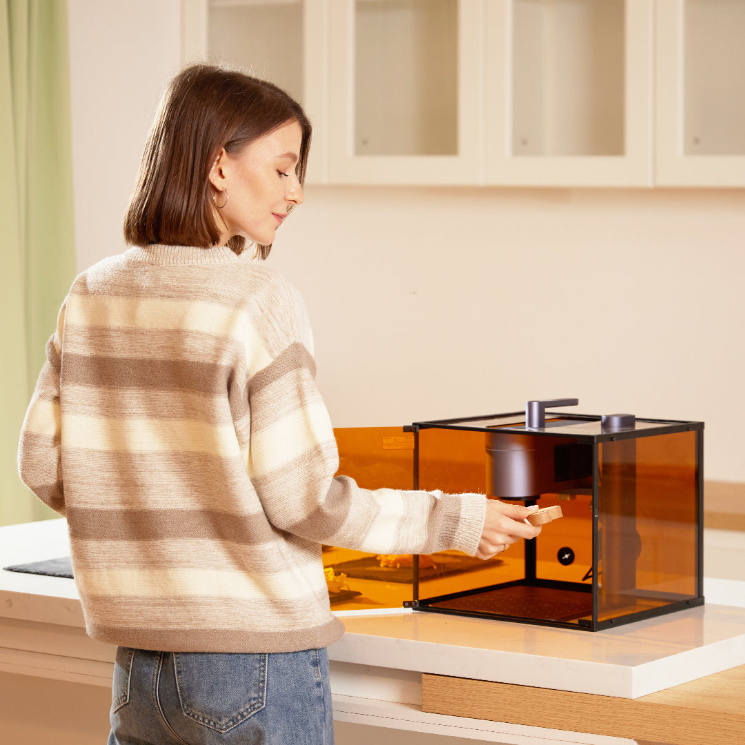 A women puts the to engraved object in the LP4 protective cover.