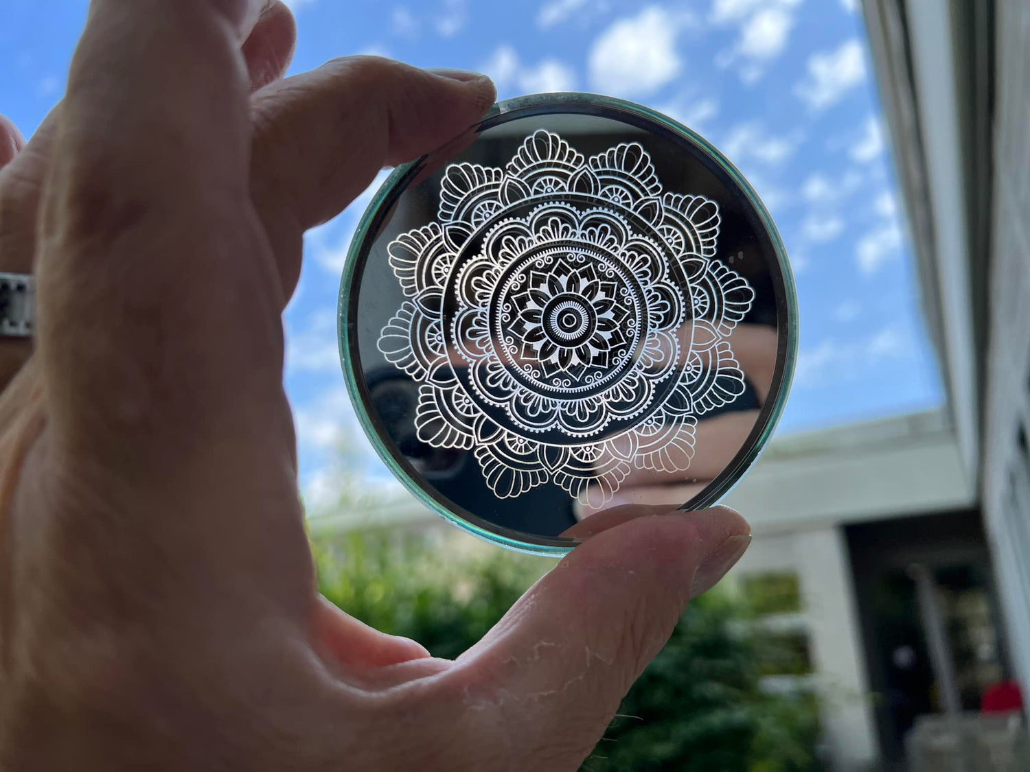 Mirror with engraved floral patterns made by Bernhard Schoner