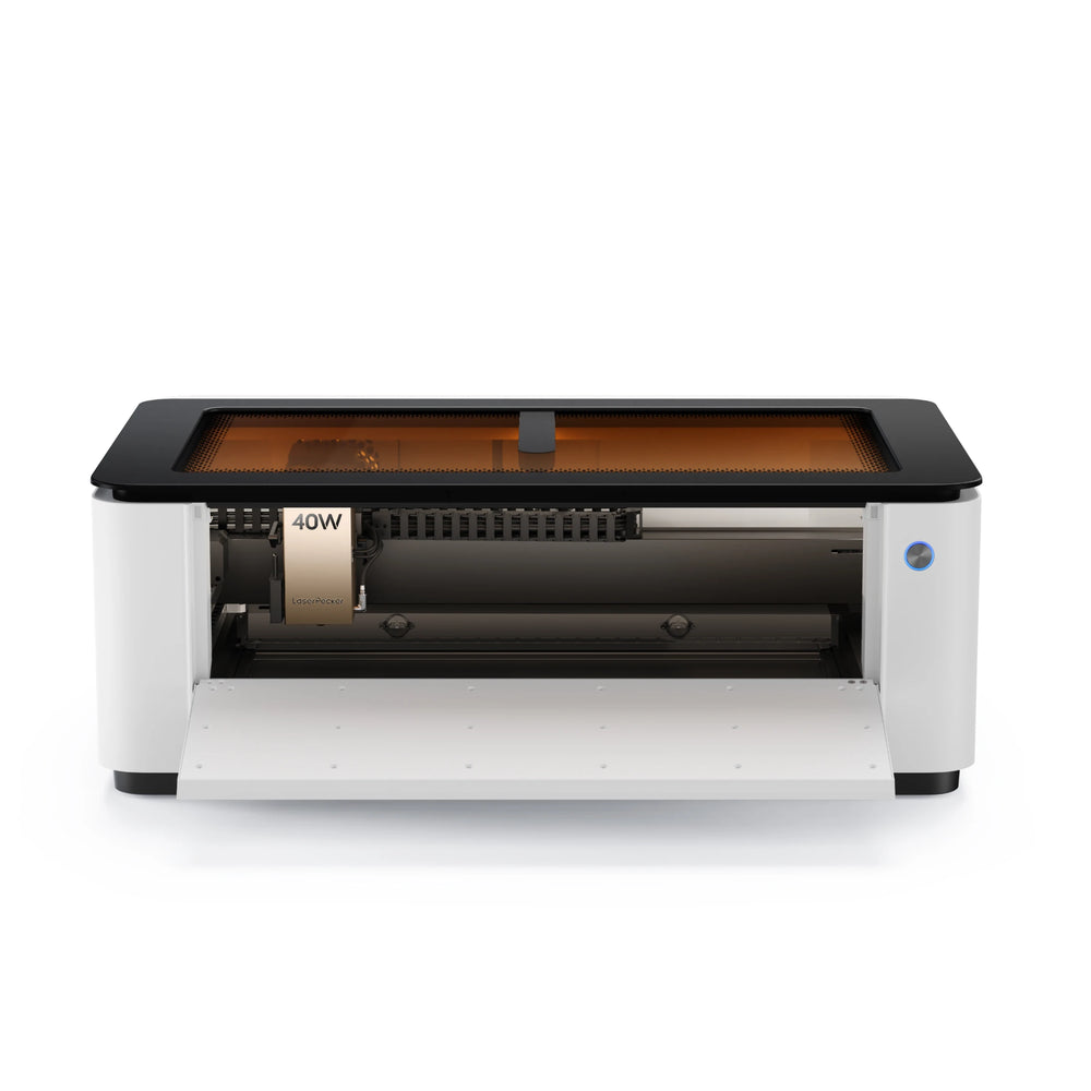 LaserPecker LX2 all-in-one laser cutter with front door open, showing 40W laser module and rotating engraving attachment