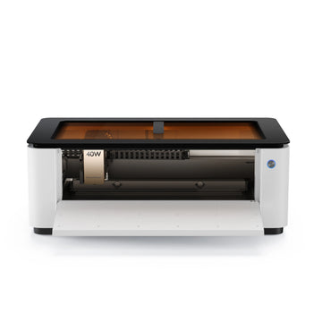 LaserPecker LX2 all-in-one laser cutter with front door open, showing 40W laser module and rotating engraving attachment