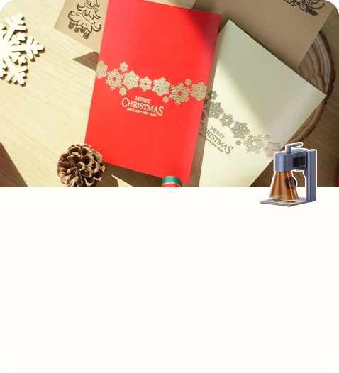 Engraved wooden ornaments and gift cards arranged for a festive Christmas display.