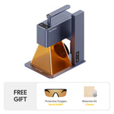 The LP2 Standard Bundle includes the LaserPecker LP2 with a compact, foldable, portable design and an amber safety shield, plus free gifts: protective goggles (worth €49.99) and a 2-piece materials kit, perfect for on-the-go engraving projects.
