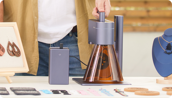 LaserPecker LP4 with PowerPack for mobile and on-the-go laser engraving.