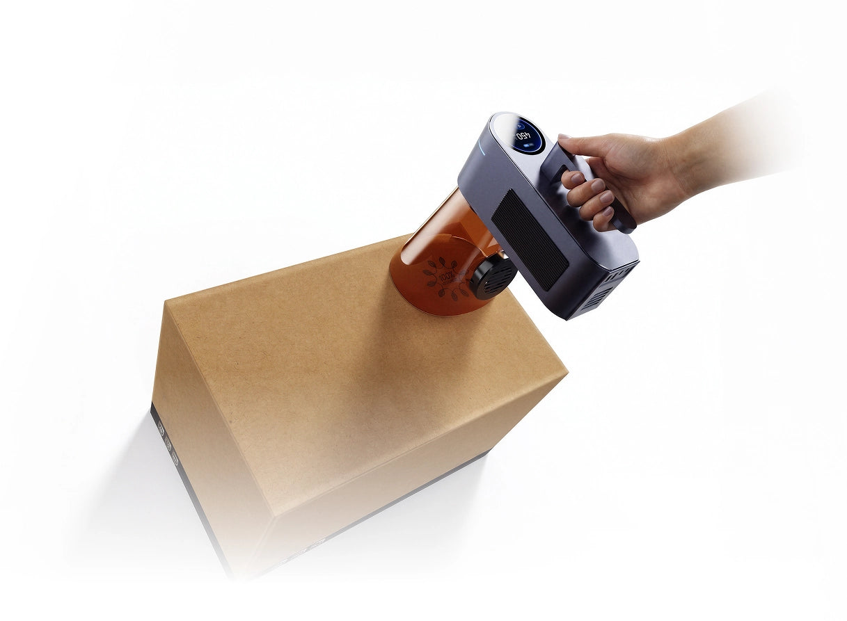 Handheld LaserPecker LP4 engraving on a large surface at a flexible angle.