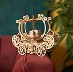 A beautiful 3D pumpkin carriage model assembled from plywood pieces laser cut by LaserPecker LP4.
