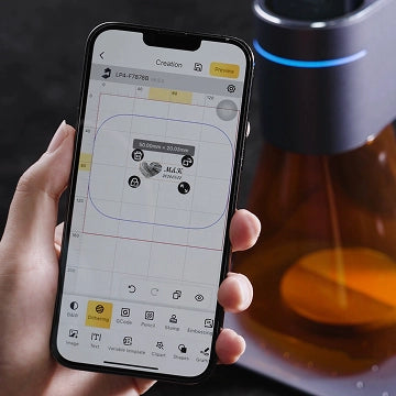 A user easily controlling LaserPecker LP4 via the LDS app on a smartphone for smart laser engraving.