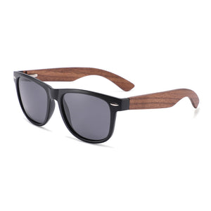 Wooden sunglasses with grey lens, black frame and dark arms